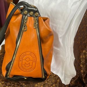 Marino Orlando L 16in H 14in W 7in.